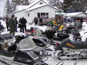 Lots of people at The Pines checking out the old snowmobiles